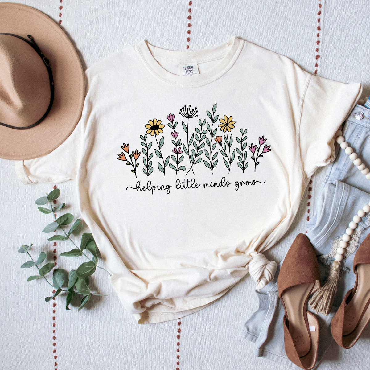 Helping Little Minds Grow - Premium Wash Tee
